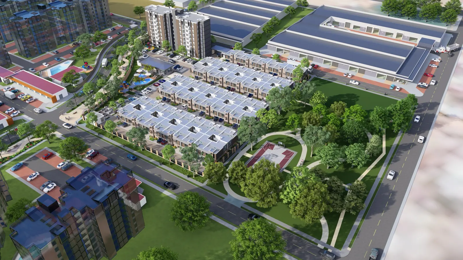 Vista aérea de la ciudadela Villa Elcira con casas, torre, zonas verdes y zona comercial