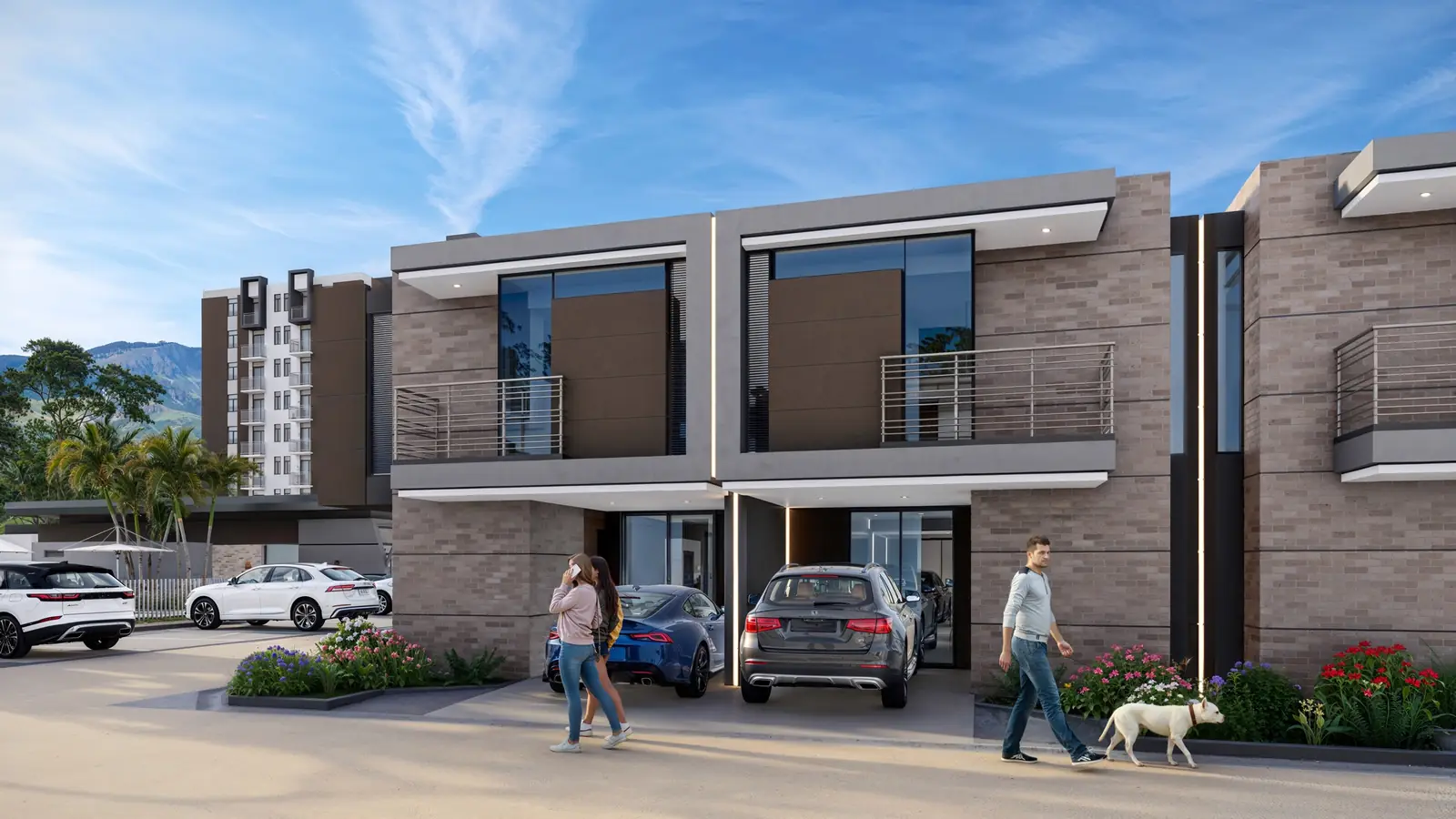 Calle interna del conjunto de casas con familias caminando