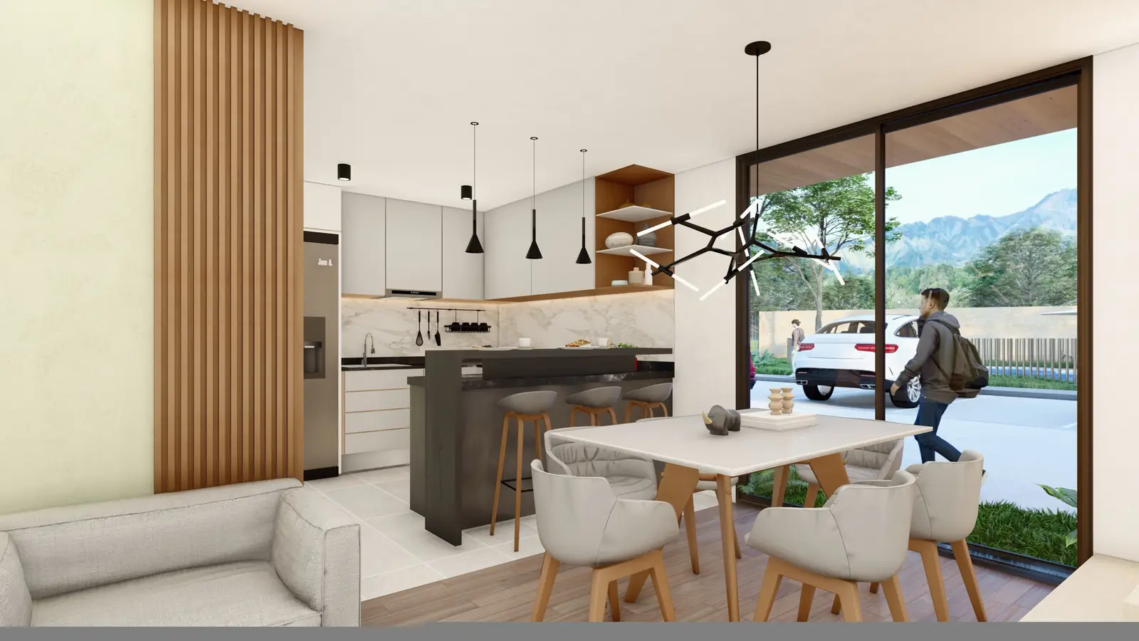 Sala y cocina abierta de la casa esquinera con salida al jardín